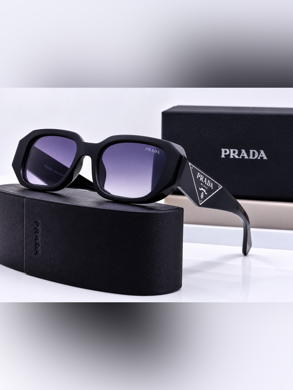Prada Black Frame Sunglasses with Gradient Purple Lenses